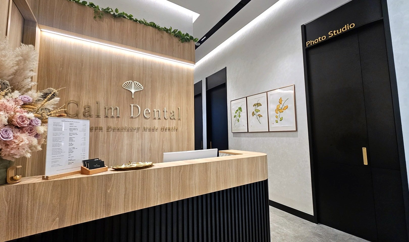 Reception, the waiting area and a treatment room at Calm Dental, Millenia Walk